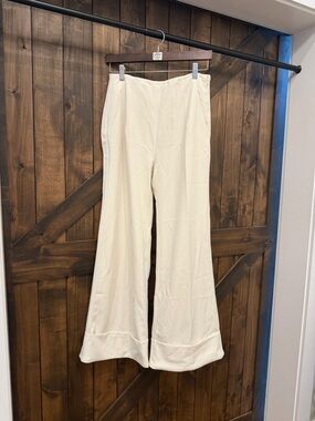 Cream Flared Wide-Leg Pants. NWT